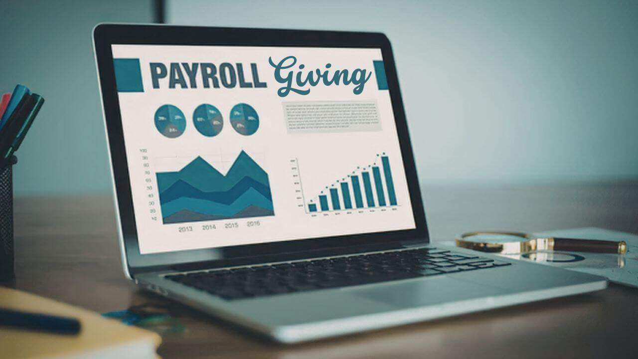 Laptop Computer with words Payroll Giving