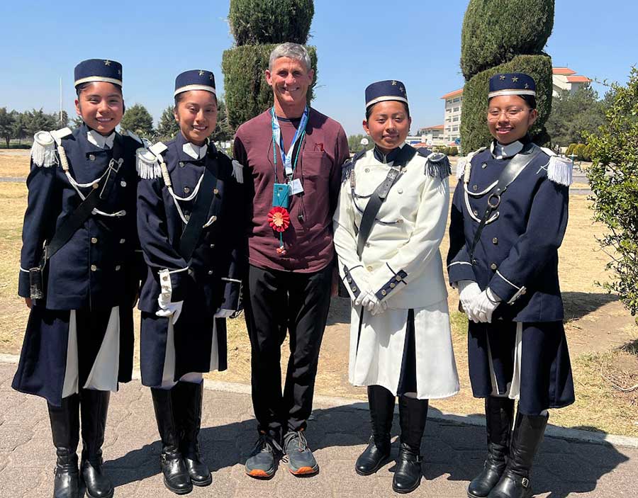 Sisters of Mary students welcome a pilgrimage visitor at Girlstown in Chalco, Mexico.