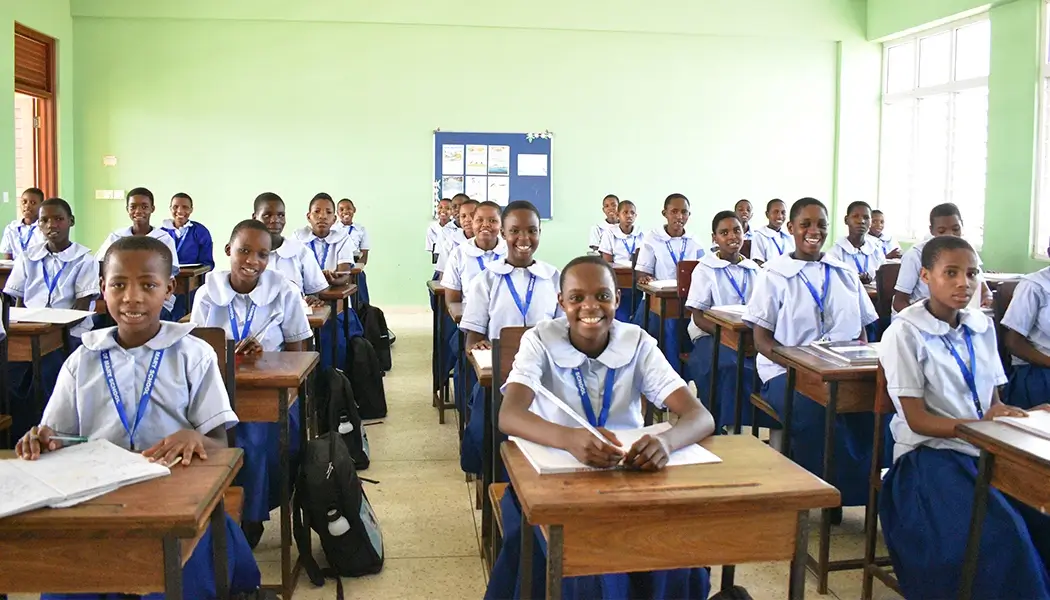 Sisters-of-Mary-World-Villages-for-Children-Girlstown-Tanzania Sisters of Mary World Villages for Children Girlstown students in uniform inside the classroom.